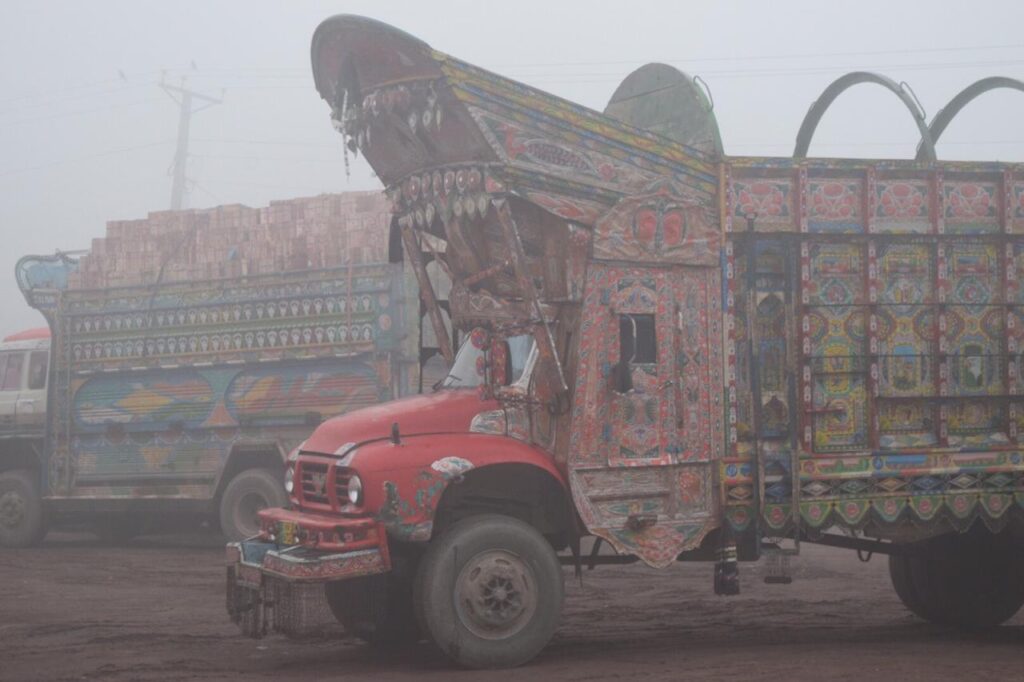 Truck with art in foggy weather