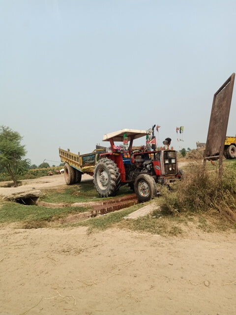 A tractor on a roadside 