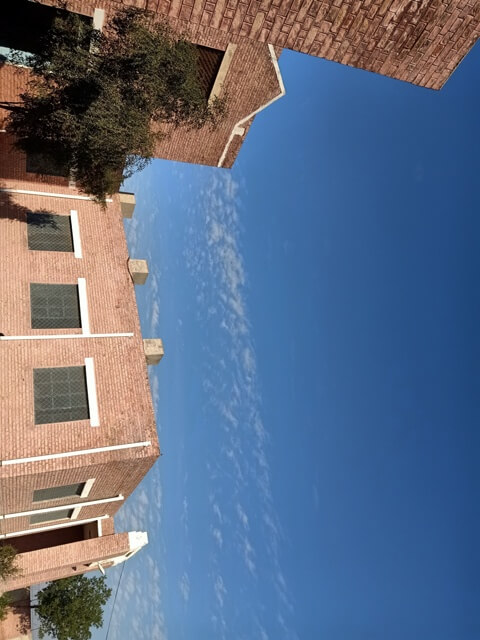 A tilt building with blue sky