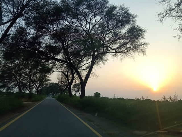 Sunset and a long road