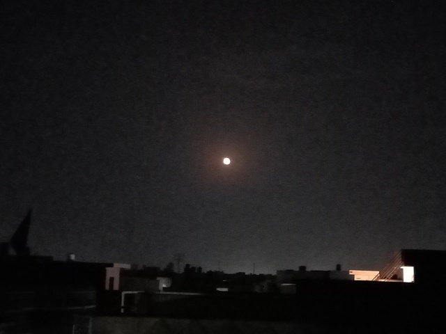Moon on a city 