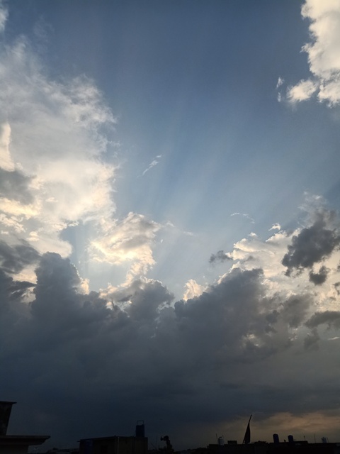 Clouds with sun beams 