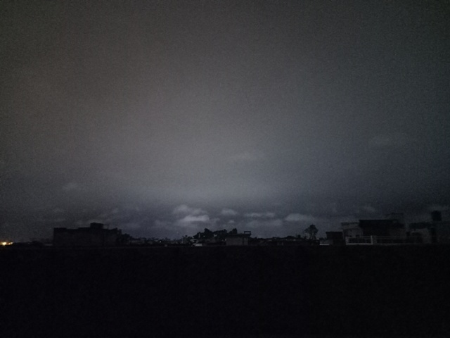 Grey clouds in night sky 
