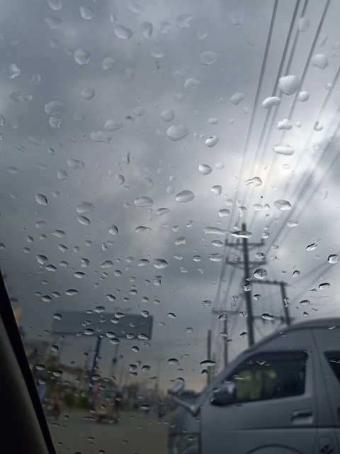 Rain drops with sky on mirror