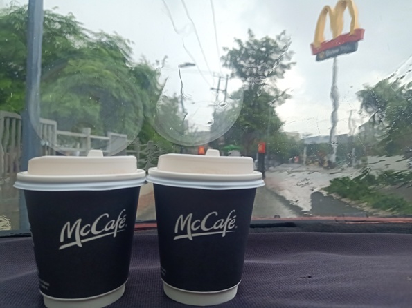 Rain and coffee while driving