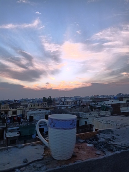 Tea with sunset clouds