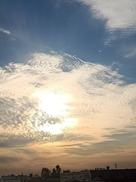 Beautiful evening clouds with sun