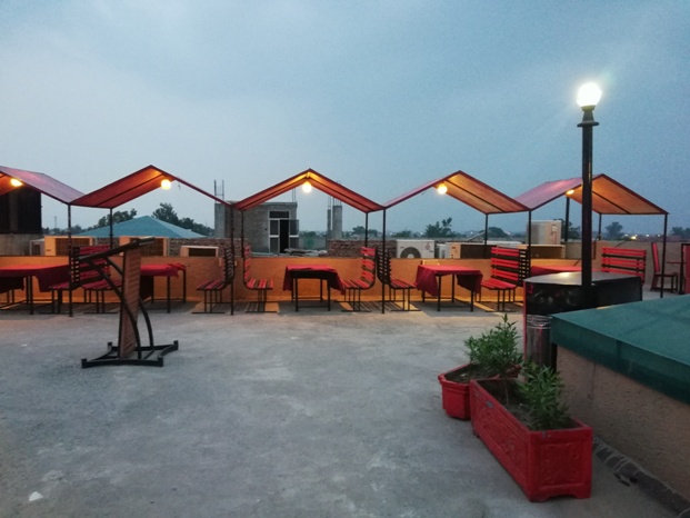 A roof top restaurant in evening