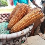 Roasted corn stall on road
