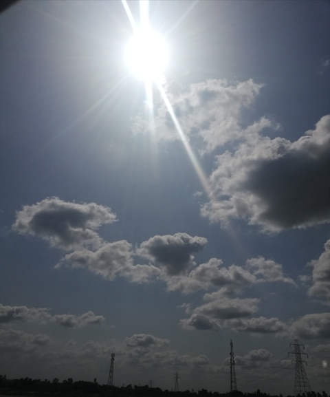 Sun and clouds in noon 