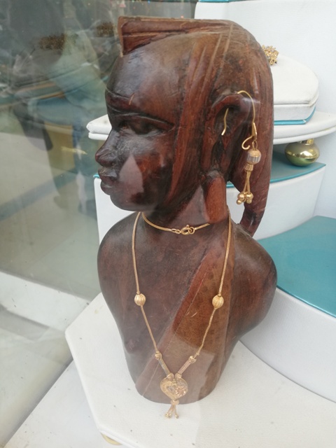 Wooden dummy in a jewelry shop