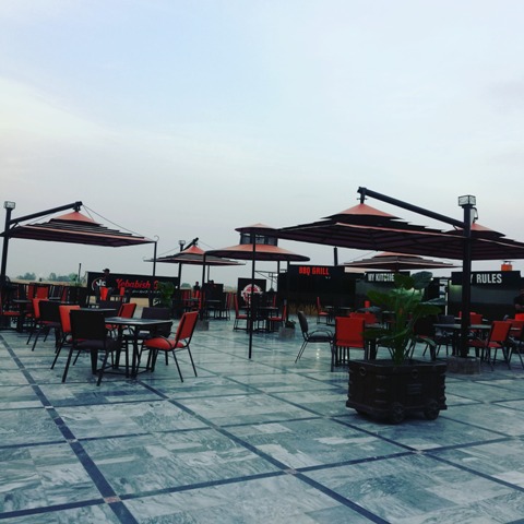 A rooftop cafe with cloudy weather