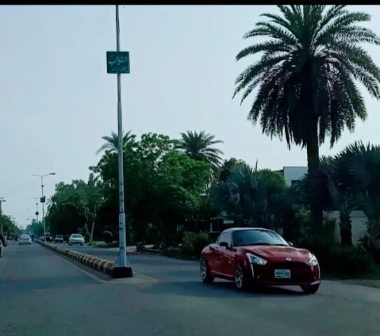 A red car on a road