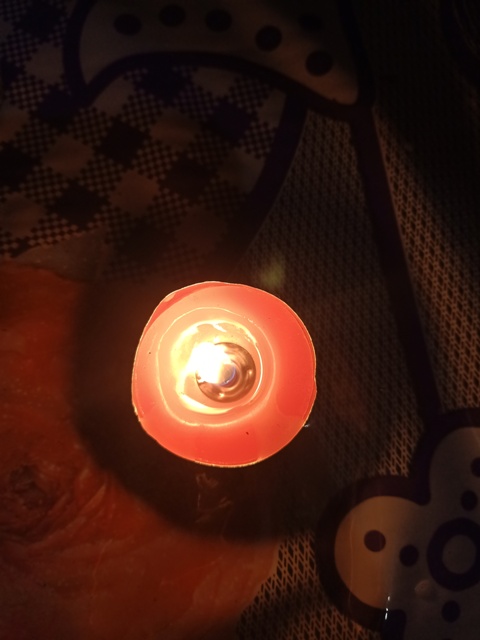 Round candle burning 