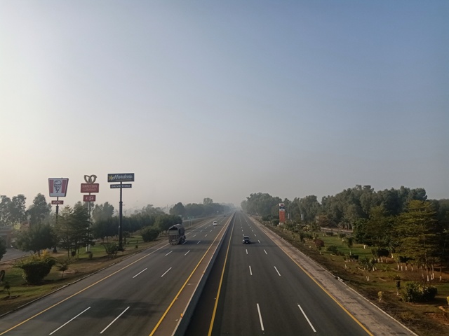 Beautiful highway in foggy weather 