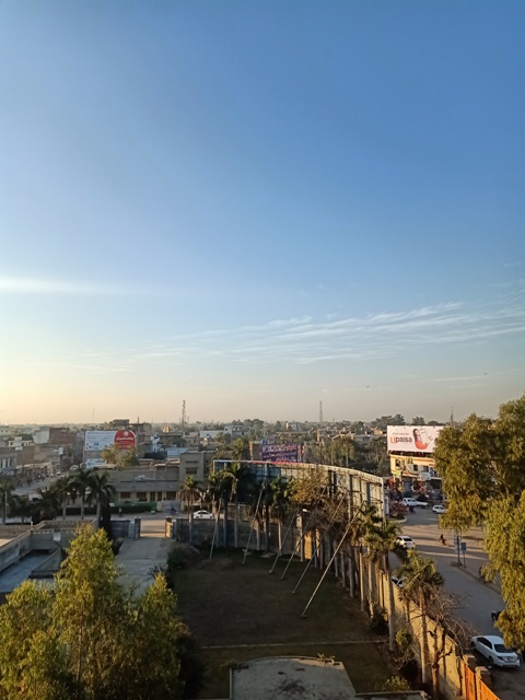 City buildings view from a rooftop restaurant 