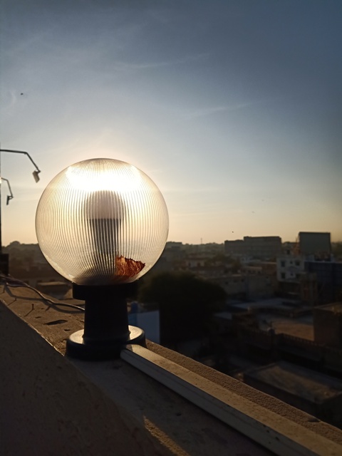 A light globe and sun set 