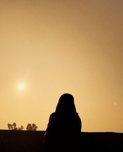 Sunset image with a girl shadow 