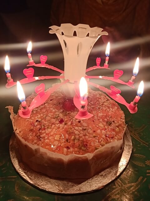 A birthday cake with a big candle decor 