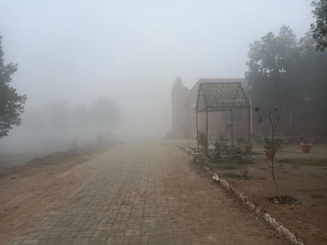 A building in a foggy morning 