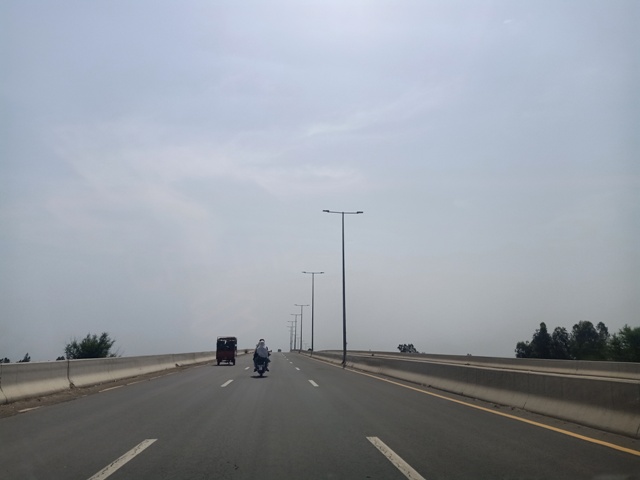 Cloudy weather and a highway 